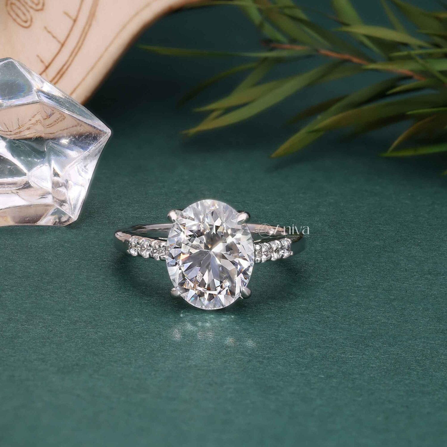 Radiant 18K White Gold Oval Solitaire Engagement Ring with Diamond Shoulders | IGI Certified
