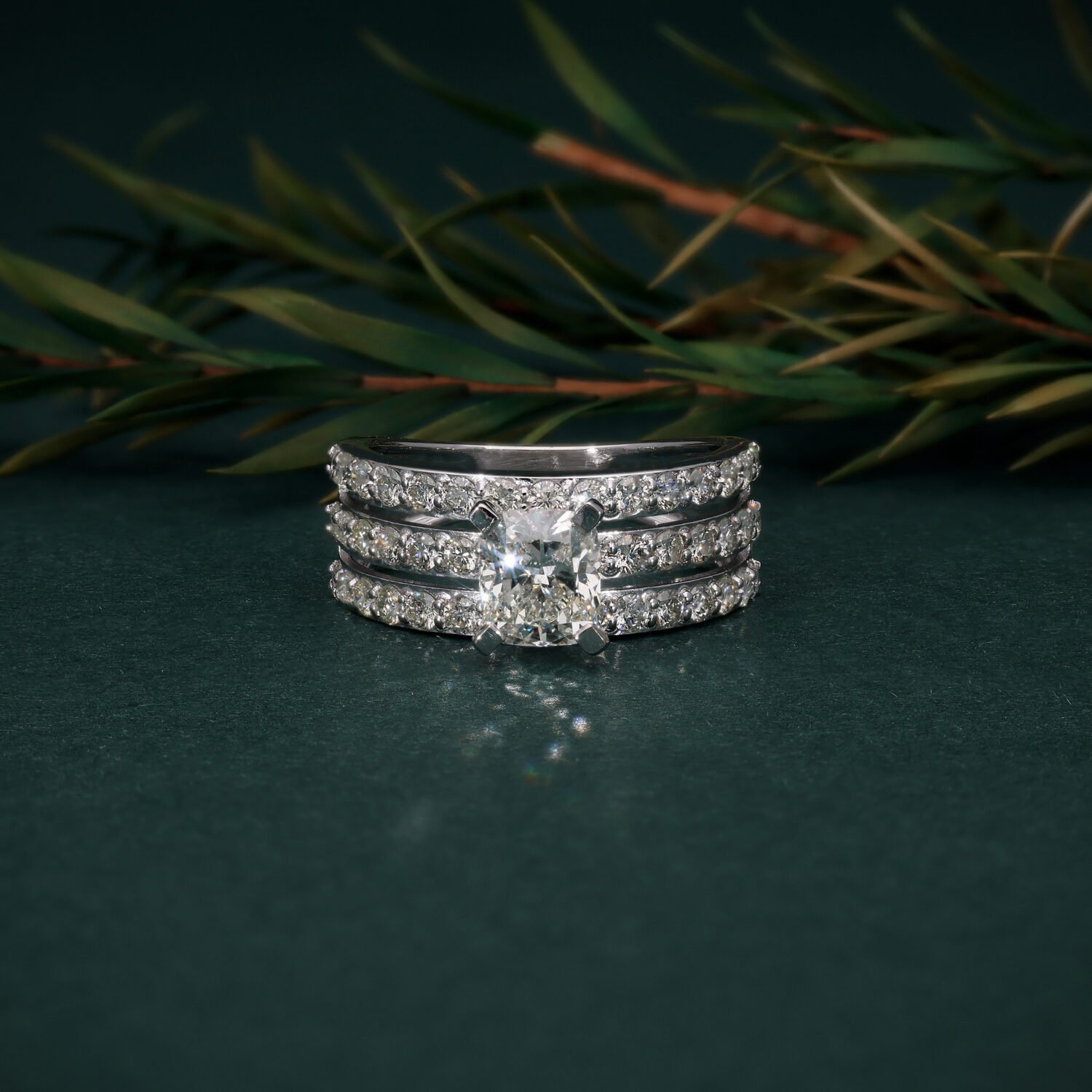 Opulent 18K White Gold Cushion Cut Ring with Triple Row Diamond Band | IGI Certified